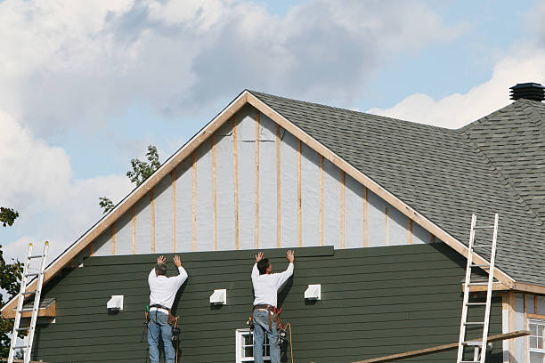Professional Siding Replacement technician working in Glen Cove, NY